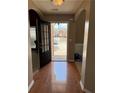 Welcoming foyer with hardwood floors, an open view, and neutral wall colors at 3345 Stoneleigh Run Dr, Buford, GA 30519