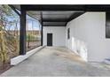 A carport with painted brick and black accents at 1383 Palmer Sw Pl, Mableton, GA 30126