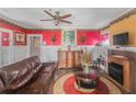 Bright living room featuring modern furniture, a fireplace, and stylish decorative accents at 799 Moreland Se Ave, Atlanta, GA 30316