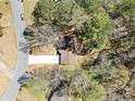 An aerial view of the property, showcasing its location surrounded by mature trees at 3435 Stallion Ct, Powder Springs, GA 30127