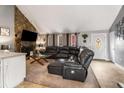Comfortable living room featuring a fireplace and adjacent to the front entrance at 3747 Junior Ln, Douglasville, GA 30135