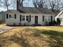 View of the home featuring a yard in need of some TLC at 1132 Fair St, Atlanta, GA 30314