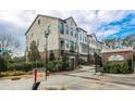 Street view of Georgetown Square gated community with well-manicured lawns at 4191 Wisconsin Dr, Dunwoody, GA 30338