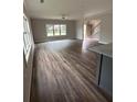 Bright and airy living room boasting hardwood floors and a clear view of the staircase and entrance at 4755 Fowler St, Acworth, GA 30101
