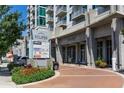 Modern high-rise building exterior with stylish entrance and signage for 'Eclipse' and various businesses at 250 Pharr Ne Rd # 318, Atlanta, GA 30305