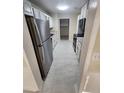 Modern kitchen with stainless steel appliances and ample cabinet space at 4473 Marjorie, Snellville, GA 30039