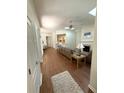 Open living space with wood floors, a fireplace and great natural light at 317 Glens Way, Woodstock, GA 30188