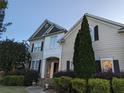 Attractive two-story home with stone accents, dark shutters, and lush landscaping in a peaceful setting at 1919 Barrett Knoll Nw Cir, Kennesaw, GA 30152