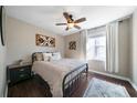 Cozy bedroom with ceiling fan, hardwood floors, and natural light at 4312 Daniel Dr, Winston, GA 30187