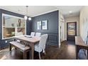Formal dining room featuring modern decor and beautiful natural light is the perfect place for Gathering dinners at 305 Norwood Ne Ave, Atlanta, GA 30317