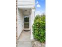 Covered front porch area of a home with house number visible and mature landscaping nearby at 3246 Wellington Sw Walk, Atlanta, GA 30331