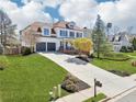 Beautiful two-story house boasting a lush lawn, long driveway, and two car garage, set in a desirable neighborhood at 3530 Horizon Ct, Cumming, GA 30041