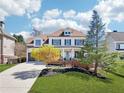 Beautiful two-story home with classic architecture, lush lawn, and a welcoming front porch at 3530 Horizon Ct, Cumming, GA 30041