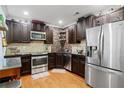 Modern kitchen featuring stainless steel appliances, granite countertops, and stylish backsplash at 11 York Trce, Cartersville, GA 30121