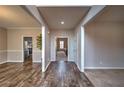 Inviting home entryway with hardwood floors and neutral paint tones at 2234 Oak Falls Ln, Buford, GA 30519