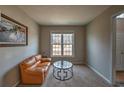 Bright living room with large window and comfortable seating area at 2234 Oak Falls Ln, Buford, GA 30519