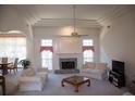 Bright living room boasts a stone fireplace, large windows, and comfortable seating at 4288 Wyndham Park Cir, Decatur, GA 30034