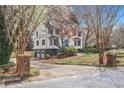 Charming two-story home with attached garage and long driveway at 930 Camden Hill Ct, Lawrenceville, GA 30046