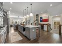Spacious kitchen with a large island, stainless steel appliances, and an open view of the living area at 4336 Walsh Dr, Dunwoody, GA 30338
