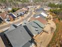 Aerial view of a neighborhood featuring well-maintained homes and landscaping at 410 Windy Ridge Way, Canton, GA 30114