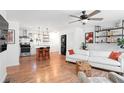 Inviting living room adjacent to the kitchen with modern appliances and stylish decor at 368 Triumph Se Cir, Atlanta, GA 30354