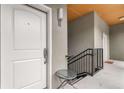 Entrance to condo with neutral walls, a small table and white door with a number five sign at 1903 Anjaco Rd # 5, Atlanta, GA 30309