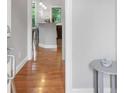 View of the entryway featuring hardwood floors leading into the kitchen area at 1903 Anjaco Rd # 5, Atlanta, GA 30309