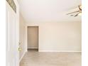 Open living area with neutral paint, wood-look flooring, and bright natural light at 8199 Cousins St, Douglasville, GA 30134