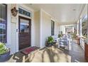 Cozy front porch with comfortable seating, classic columns, and a welcoming entrance at 733 Cherokee Se Ave, Atlanta, GA 30315