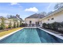 Inviting backyard with a sparkling pool and lounge chairs, perfect for relaxation and outdoor enjoyment at 733 Cherokee Se Ave, Atlanta, GA 30315