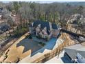 Aerial view of a brick home with a private yard, showcasing the property's layout and landscaping at 2417 Siesta Ct, Marietta, GA 30062