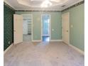 Bright main bedroom boasting an ensuite bathroom and a walk-in closet at 5150 Rockford Ln, Stockbridge, GA 30281