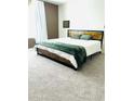 Neutral bedroom features carpet and natural light at 2633 Coventry Sw St, Atlanta, GA 30331