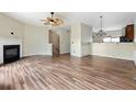Bright living room featuring a fireplace and wood floors at 700 Celeste Sw Ln, Atlanta, GA 30331
