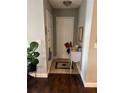 Inviting entryway with tiled floor, complemented by a small table and decorative items at 2611 Huntingdon Chase, Atlanta, GA 30350