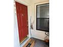 Inviting red front door with traditional hardware and seasonal decorations at 2611 Huntingdon Chase, Atlanta, GA 30350