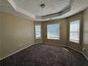 Bedroom with plush carpeting, neutral walls, and natural light from the window at 287 Bramlett Meadows Dr, Douglasville, GA 30134