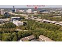 Aerial view showcasing proximity to Truist Park and major highways, convenient for commuters and baseball fans at 1303 Highland Bluff Se Dr # 303, Atlanta, GA 30339