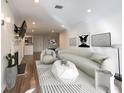 Modern living room design featuring neutral tones, stylish furniture, and ample natural light at 1303 Highland Bluff Se Dr # 303, Atlanta, GA 30339