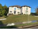 Stunning two-story home boasting a manicured lawn and a classic architectural design at 3312 Steeple Chase Sw Way, Conyers, GA 30094