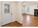 Bright entryway with hardwood floors and an arched doorway leading to the main living space at 1140 Goodwin Ne Pl, Atlanta, GA 30319