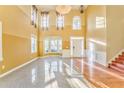 Bright living room with high ceilings, tile and hardwood floors at 3510 Long Lake Dr, Douglasville, GA 30135