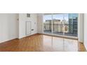 A bright and open living space with beautiful wood flooring and expansive city views at 620 Peachtree Ne St # 1806, Atlanta, GA 30308