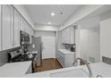 Bright kitchen featuring stainless steel appliances, quartz countertops and grey shaker cabinets at 3636 Habersham Nw Rd # 2208, Atlanta, GA 30305