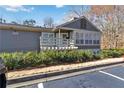 Charming condo showcasing a well-maintained facade with a private balcony area at 2006 Riverview Dr, Marietta, GA 30067