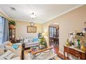 Inviting living room boasting hardwood floors, neutral paint, and plenty of decor at 1699 Boulder Walk Se Dr, Atlanta, GA 30316