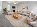 Bright living room with plush carpet, fireplace, and stylish furnishings at 20 Pine Canyon Sw Dr # 15, Atlanta, GA 30331