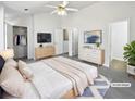 Spacious main bedroom with a plush bed, walk-in closet, and plenty of natural light at 20 Pine Canyon Sw Dr # 15, Atlanta, GA 30331