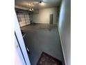 Spacious and well-lit two-car garage with ample storage space at 1620 Marsanne Nw Ter # 26, Kennesaw, GA 30152