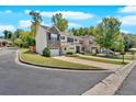 Charming townhome community featuring stone accents, well-manicured landscaping, and attached garages at 258 Ridge Mill Dr, Acworth, GA 30102